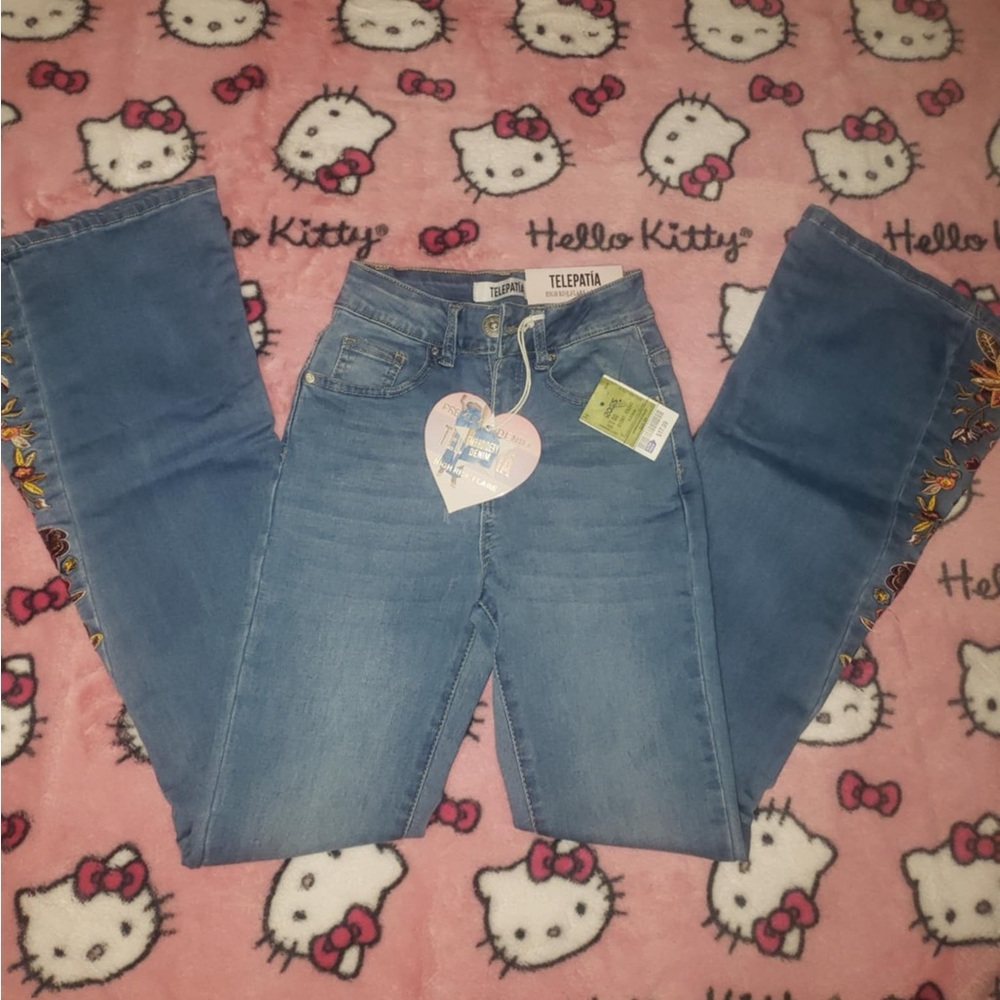 Telepatia flare embroidered jeans